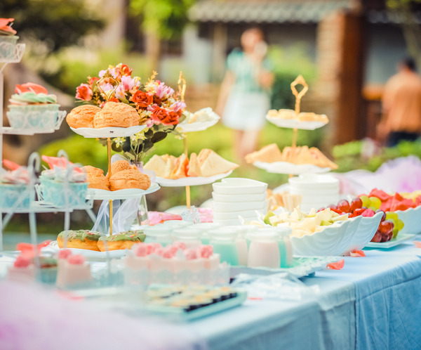 Various Desserts on a Table covered with Baby Blue Cover