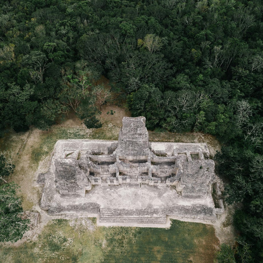 Ruins of Ancient Mayan Tomb Stone in the Forest